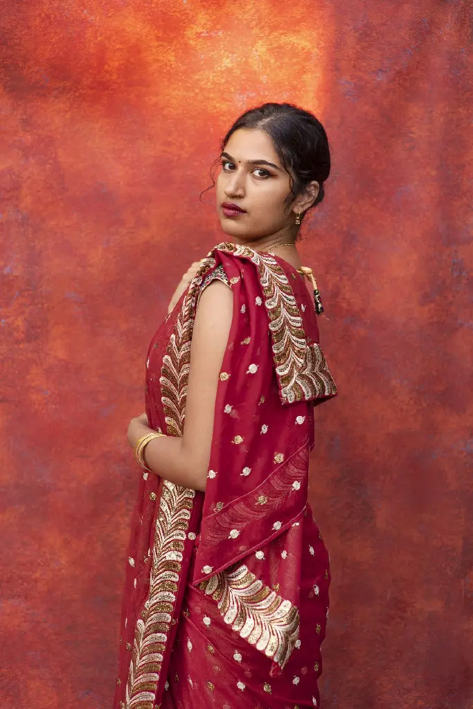 portrait-young-woman-wearing-tradition-sari-garment (1).webp