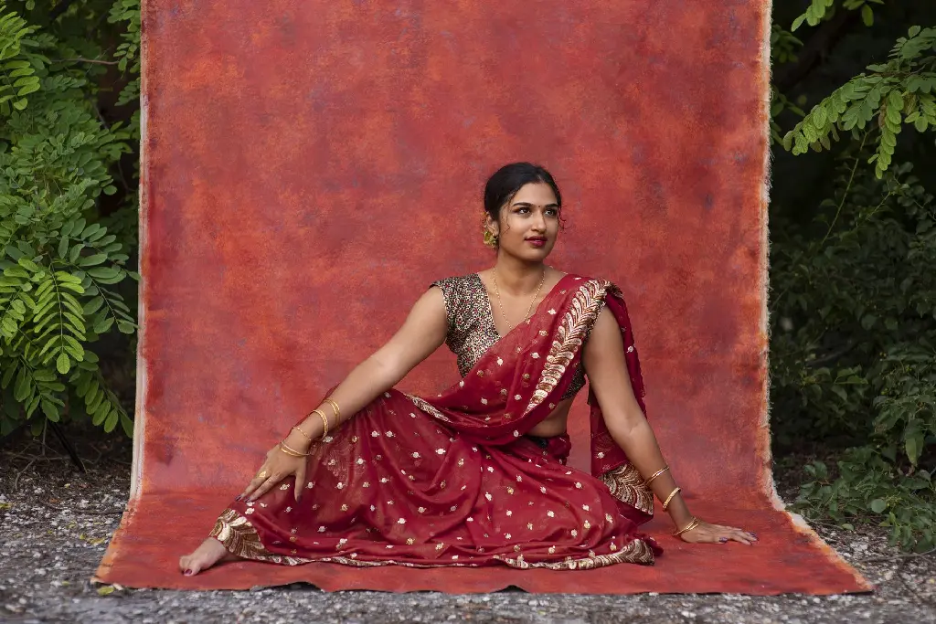 portrait-young-woman-wearing-tradition-sari-garment (2).webp