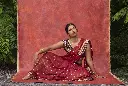 young-woman-posing-while-wearing-traditional-sari-garment.webp